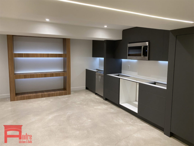 Modern Kitchen With Austrian Laminate, Push Open Doors, Quartz Countertop, Natural Veneer Liquor Display, And Led Lighting 2