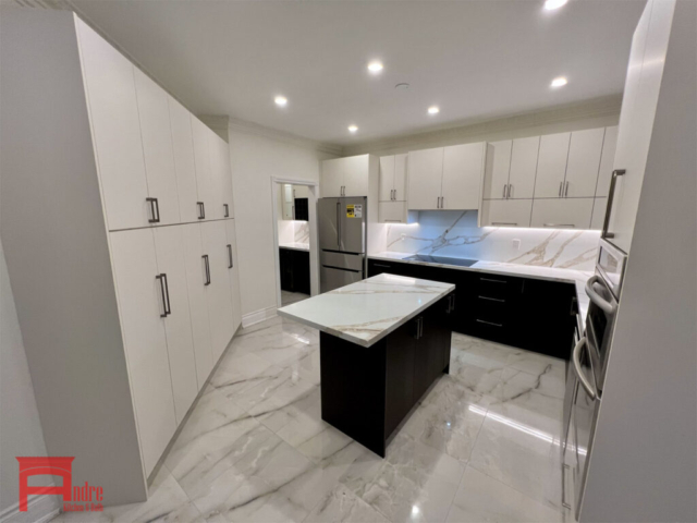 Modern Kitchen With Soft Touch Austrian Laminate, Quartz Countertop, And Bar Area With Wine Rack And Wine Cooler