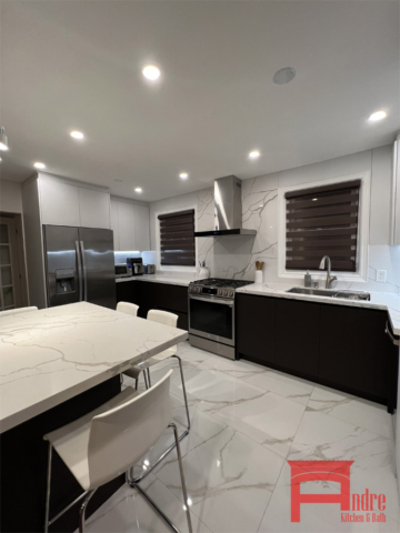 Modern Kitchen With Soft Touch Matte Austrian Laminate Handle Less Doors, Island, Quartz Countertop And Backsplash