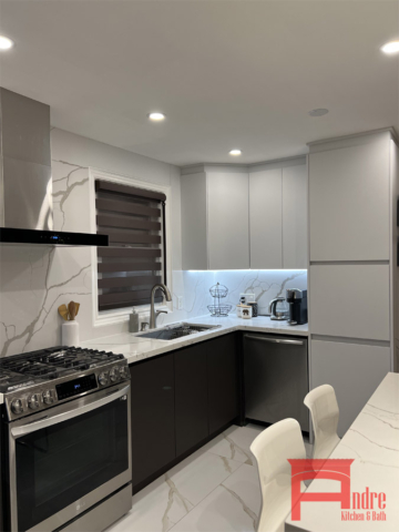 Modern Kitchen With Soft Touch Matte Austrian Laminate Handle Less Doors Island, Quartz Countertop And Backsplash And Led Lighting