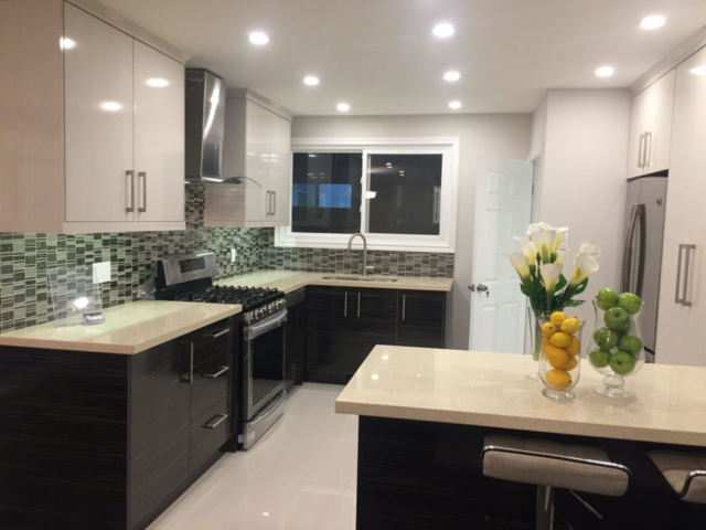 Modern Kitchen With High Gloss Doors And Quartz Countertops